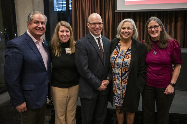 Group photo of ICD PhD alumni
