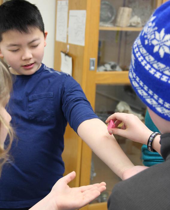 Student and staff member interacting