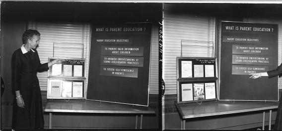 1960s era photo of a woman pointing to a letter board that says What is Parent Education?