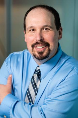 Headshot of Glenn Roisman